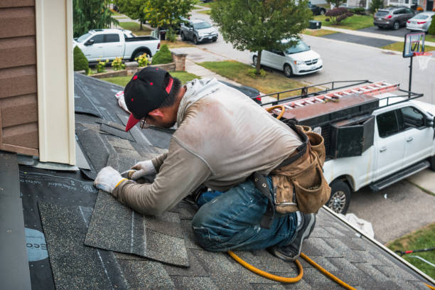 Professional Gutter Installation technician working in Haslett, MI
